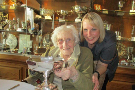 Golf club honours local care home resident